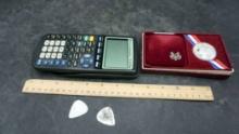 Guitar Picks, Calculators, United States Mint Medallion & Key In Box