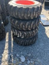 (4) 10-16.5 SKS1 Skid steer tires on rims for bobcat