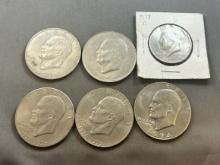 5- Eisenhower Dollar coins and 1978-D Half Dollar