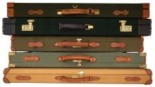 FIVE GOOD QUALITY CANVAS AND LEATHER GUN CASES.