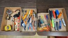 4 boxes with tape measures, marking pencils, nut