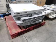 pallet of plastic top folding tables