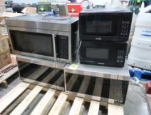 pallet of assorted microwave ovens