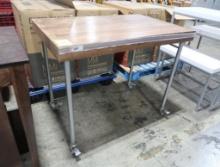 merchandising table on casters- steel frame & wooden top