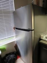 LG stainless front refrigerator freezer conbo in employee break room model LTC5242235 / 06