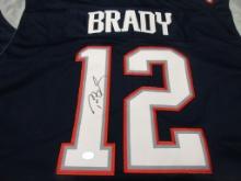 Tom Brady of the New England Patriots signed autographed football jersey TAA COA 553