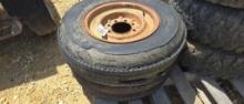 (2) 8 BOLT STEEL TRAILER RIMS WITH BAD TIRES