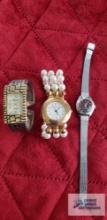 Geneva ladies cuff watch,...Contempo pearl like watch, and Aseikon watch (Description provided by