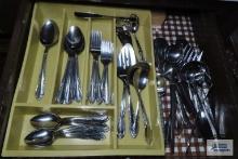 Assorted flatware and serving pieces
