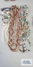 Stone and shell like costume jewelry necklaces and bracelets