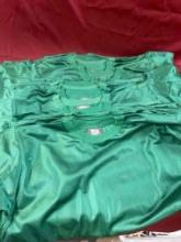 New, green men's jerseys. 1 small, 2 medium, 9 XL, 12 XXL. 24 pieces total