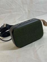 Unboxed but unused Mini splash resistant Bluetooth Speaker with charger and built in mini lanyard,