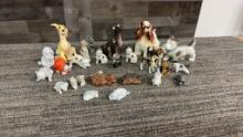 COLLECTION OF MINIATURE DOG FIGURINES