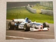 Autographed Photo of Formula 1 Champion Damon Hill