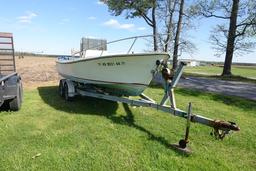 #4001 1979 SHAMROCK 20' CENTER KEEL DRIVE CONSOLE WITH 1985 LOAD RITE TRAIL