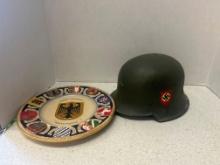 German World War II type helmet and German plate