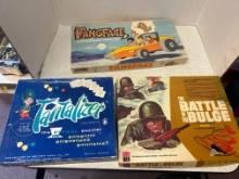 three vintage board games, Fangface Scooby Doo, tantalizer, and battle of the bulge