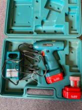 Makita rechargeable drill with 2 batteries and charger in case