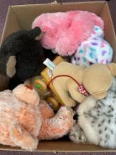 Box of plush animals