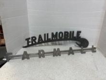 Farmall and Trailmobile emblems