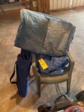 2 outdoor chairs with 2 camping chairs and tarps