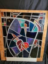 Large church stained glass window, heart and and dagger themed